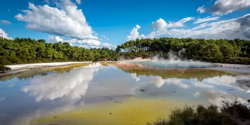 Artist’s Palette geothermal feature with colourful mineral deposits and steam at Waiotapu Thermal Wonderland, Rotorua