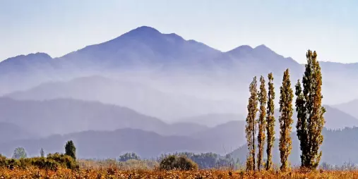 Misty view of the Richmond Ranges above Cloudy Bay in Marlborough on a clear day.