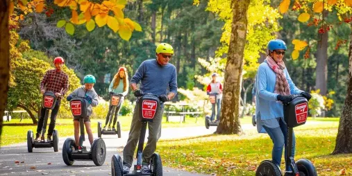 Segway riders enjoying an autumn ride through Queenstown Gardens